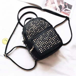 gunmetal gold studded black backpack edgability