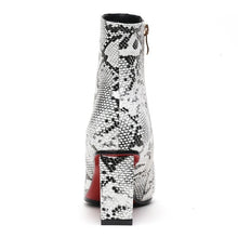 snakeskin boots ankle boots heeled boots edgability back view