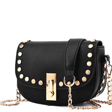 black gold studded handbag angle view edgability