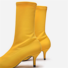 yellow boots with kitten heels edgability angle view