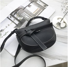 black bag sling bag classy bag edgability angle view