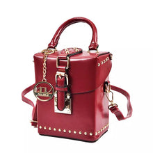 box bag studded bag red bag edgability angle view