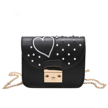 silver spikes studded heart black bag front view edgability