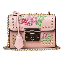 pink embroidered studded bag edgability