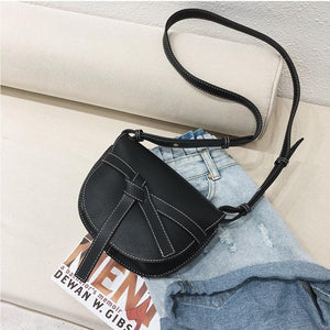 black bag sling bag classy bag edgability top view