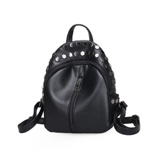 edgability silver studded black mini backpack angle view