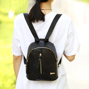 black mini backpack croc skin bag edgability model view