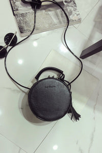 box bag round bag black bag with tassels edgability full view