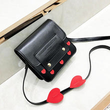 hearts sling bag black bag edgability top view