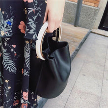 black bag bucket bag luxury bag wristlet edgability model view