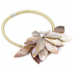 beige gold statement neckpiece with exotic floral design angle view edgability