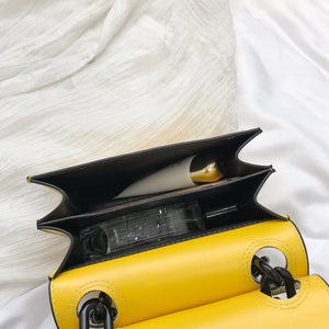 croc skin yellow sling bag with black strap edgability inside view