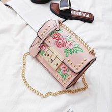 pink embroidered studded bag edgability top view