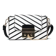 black stripes on white handbag front view edgability