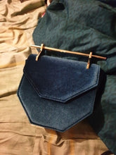 velvet blue classy bag with gold handle edgability top view