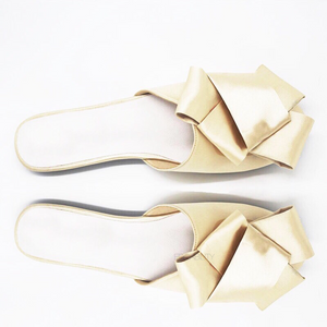 classy bow gold flats top view egdability