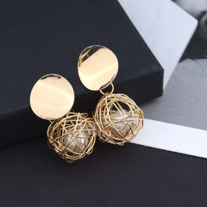 statement earrings gold earrings with pearls edgability top view