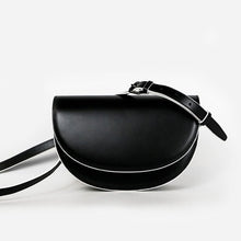 semi circle black and white sling bag edgability front view