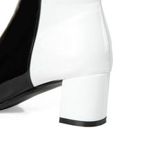 black white ankle boots dual color trendy shoes edgability heel view