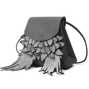 grey bag mini backpack embroidered bag edgability angle view