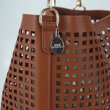 brown handbag bucket bag edgability detail view