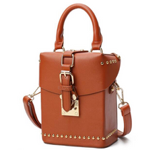 brown box bag with buckle egdability angle view