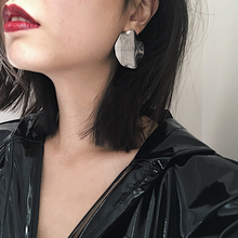 silver earrings statement jewelry edgability model view