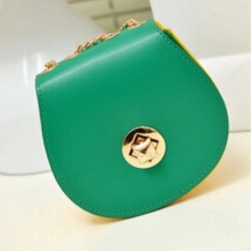 green purse with yellow sides edgability