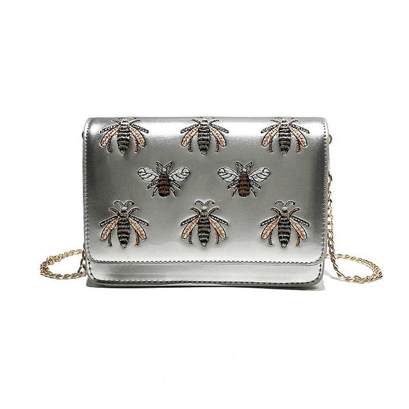 silver bag sling bag with bugs insects edgability