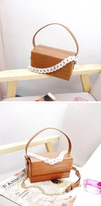 brown croc skin clutch box bag with chain strap edgability angle view