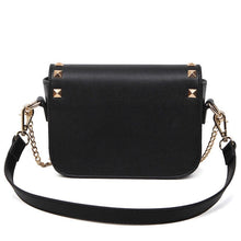 black and beige handbag with gold studs back view edgability