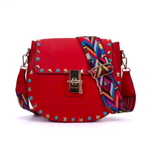 studded red sling bag with colourful strap edgability