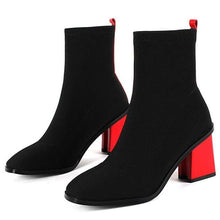 black boots ankle boots red heels edgability front view