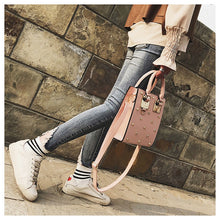 heart rivets studded bag edgability model view