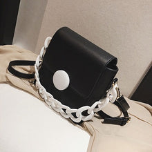 black bag clutch bag sling bag white strap edgability top view