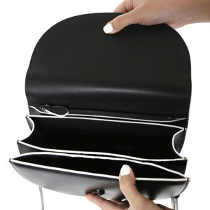 semi circle black and white sling bag edgability inside view