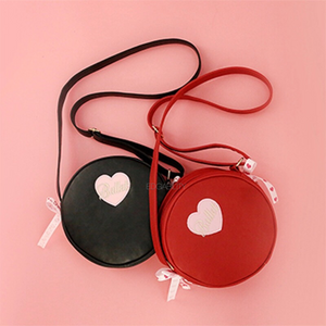 red round bag black round bag front view edgability