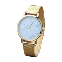 gold watch marble design dial edgability angle view