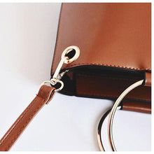 brown bucket bag with ring handle edgability detail view