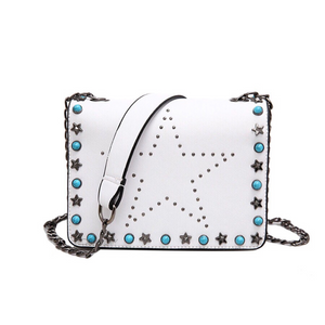 white star studded bag with rivets edgability