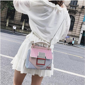 striped bag trendy bag womens bag edgability model view