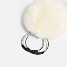 white fur bag with hoop handles edgability top view