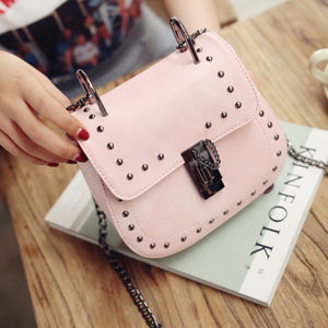 pink studded bag edgy fashion edgability model view