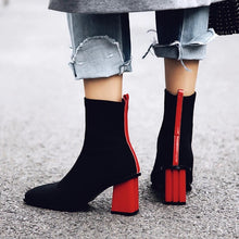 black boots ankle boots red heels edgability model view