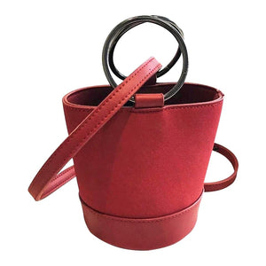 red bag bucket bag minimalist fashion edgability front view