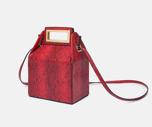 box bag snakeskin bag red bag bucket bag edgability side view