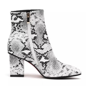 snakeskin boots ankle boots heeled boots edgability side view