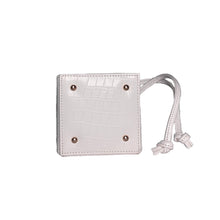 snakeskin white triangle handbag wristlet sling bag bottom view