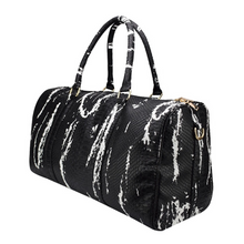 black and white bag marble travel bag edgability angle view