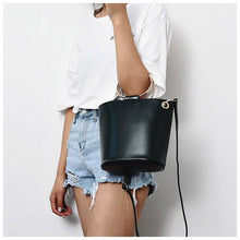 black bag bucket bag with ring handle edgability model view